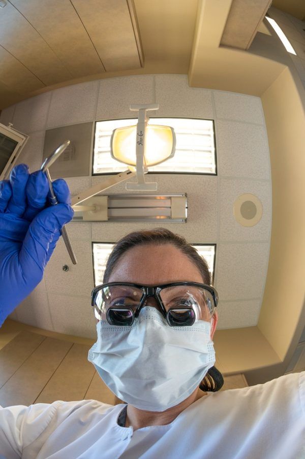 Dr. Lynch wearing magnifying loupes
